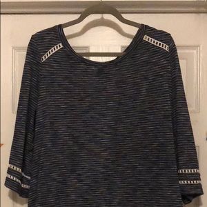 Blue and white striped shirt.